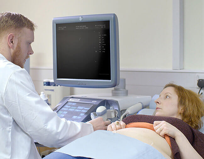 Woman having a scan